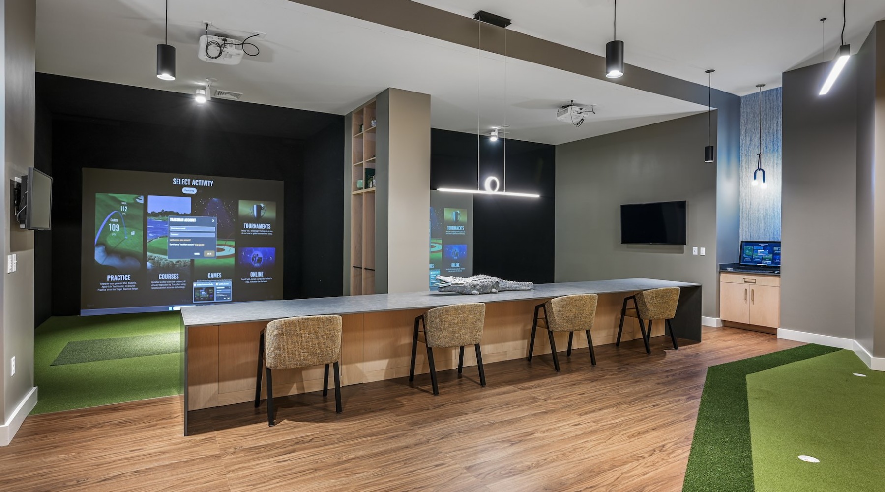 The golf simulator room at our apartments in Everett, MA