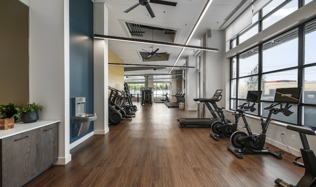 Modern fitness center with a variety of equipment