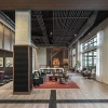 Large leasing office with high ceilings and seating